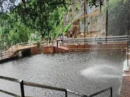 Beautiful view of Kakolat Waterfall surrounded by lush greenery in Bihar