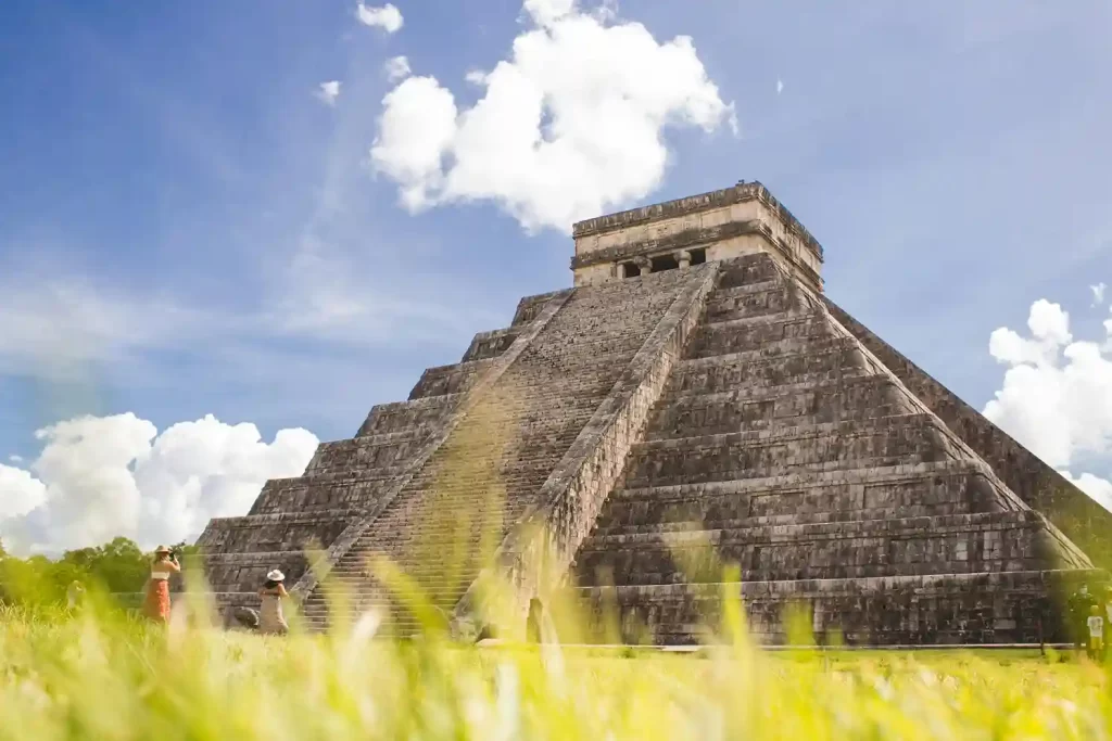 El Castillo pyramid at Chichen Itza under a clear blue sky in Yucatán, Mexico