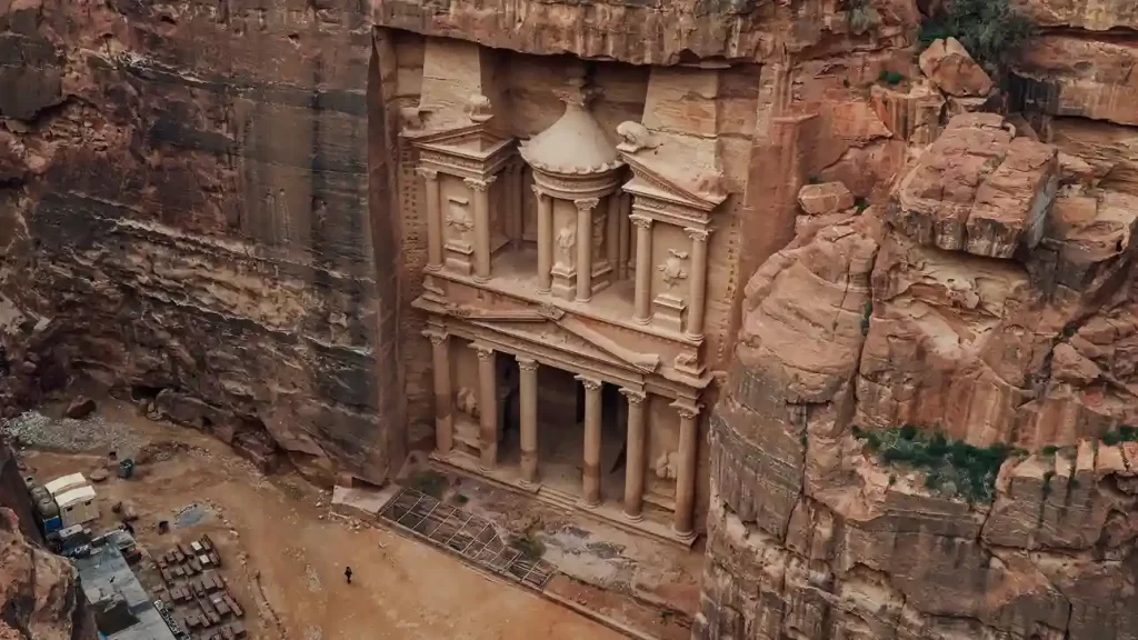 The Treasury at Petra, Jordan carved into rose-colored sandstone cliffs